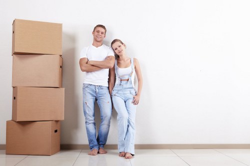 Removal team planning a home move in Barnes with boxes and furniture