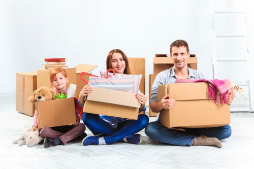 Careful loading of household furniture for urgent removals in Barnes