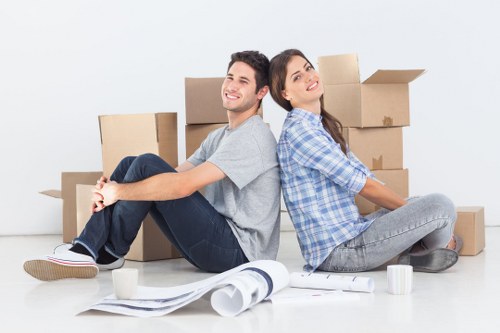 Commercial furniture and boxes organised for an office move in Barnes