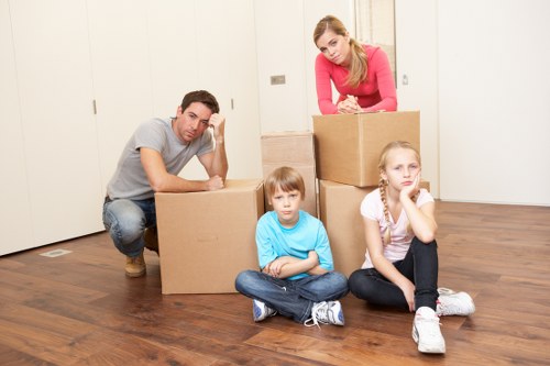 Careful loading of a piano for transport in Barnes and nearby areas