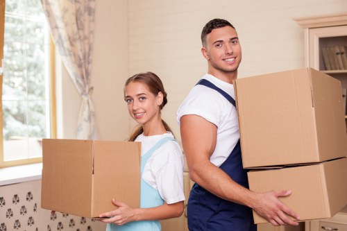 Professional movers loading items carefully for a Barnes relocation